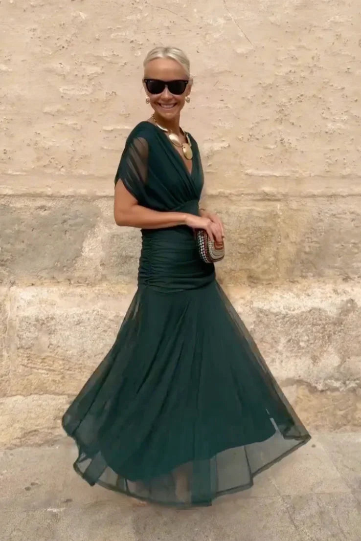 Elegantné dlhé spoločenské šaty s výstrihom do V
