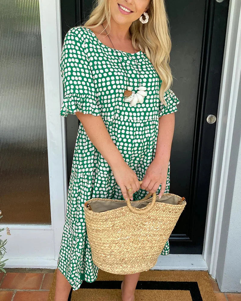 Sandra | Midi šaty s okrúhlym výstrihom a bodkovanou potlačou
