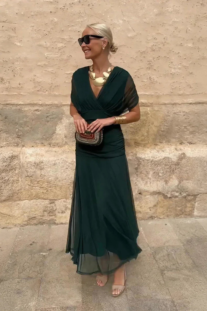 Elegantné dlhé spoločenské šaty s výstrihom do V