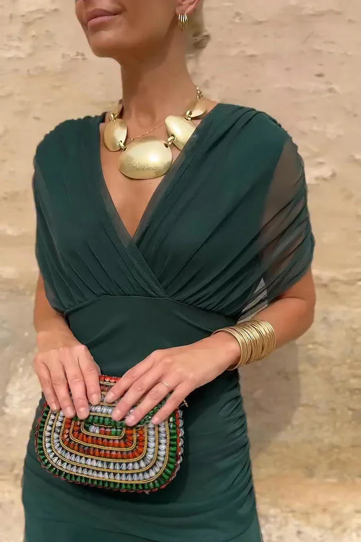 Elegantné dlhé spoločenské šaty s výstrihom do V